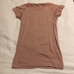 Small lululemon shirt orange in color